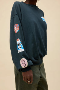 DAYDREAMER - Ski Patch & Pass Collector Oversized Sweatshirt in Washed Black